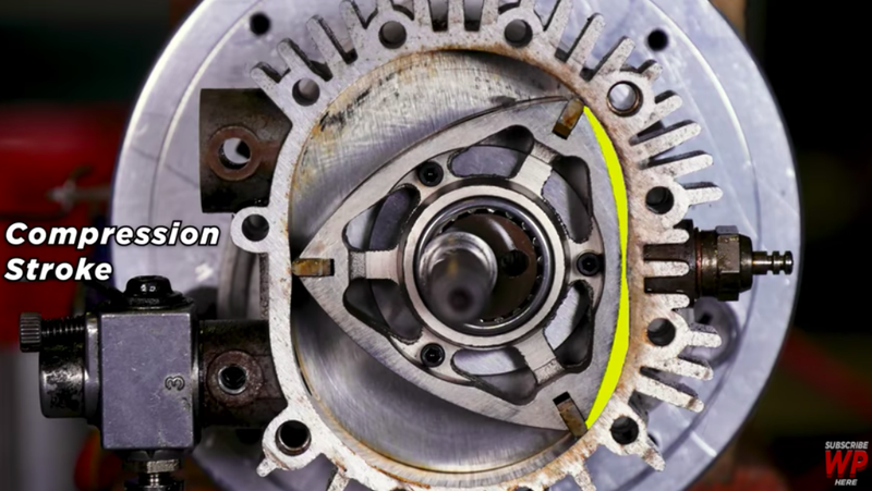 Illustration for article titled Watch A Wankel Rotary Engine’s Beautiful Explosions Through A Transparent Housing